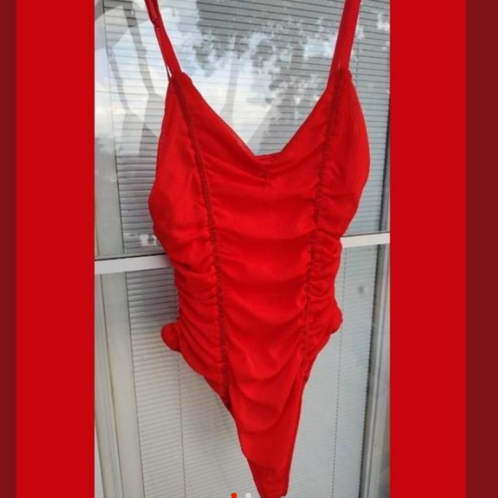 Red tule lined bodysuit